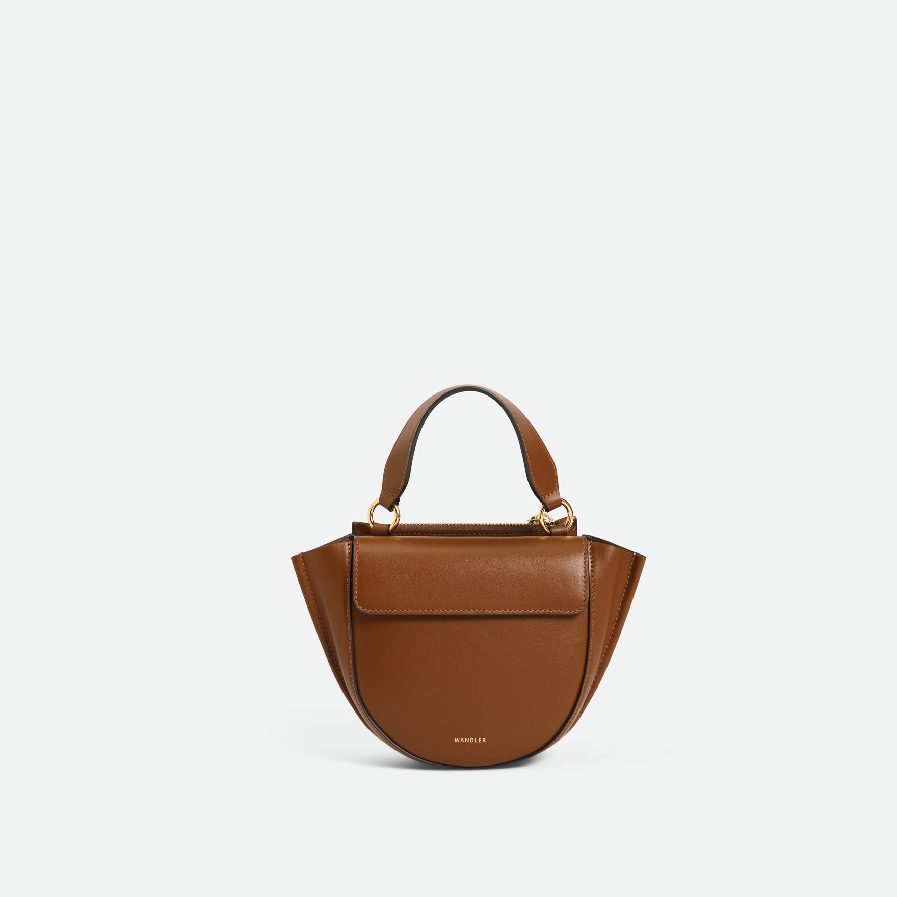 Wandler Hortensia Bag Piccola in the color Saddle made from Italian calf leather with golden hardware and rounded silhouette, front view.