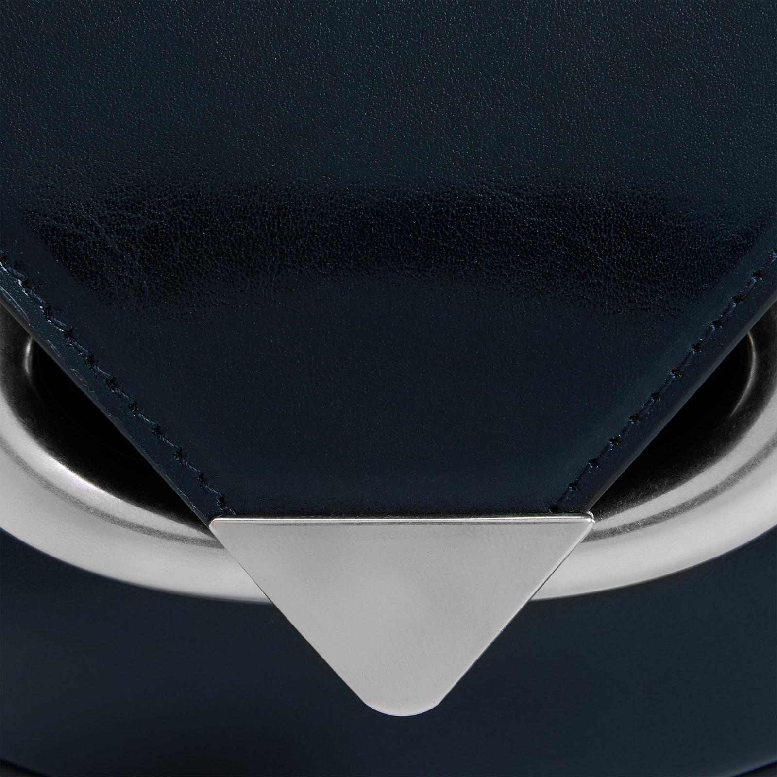 Wandler Veneto Crossbody Small in Orion Glaze, deep dark blue, Italian calf leather with silver clasp hardware and structured silhouette, close up detailing the clasp and  leather. 