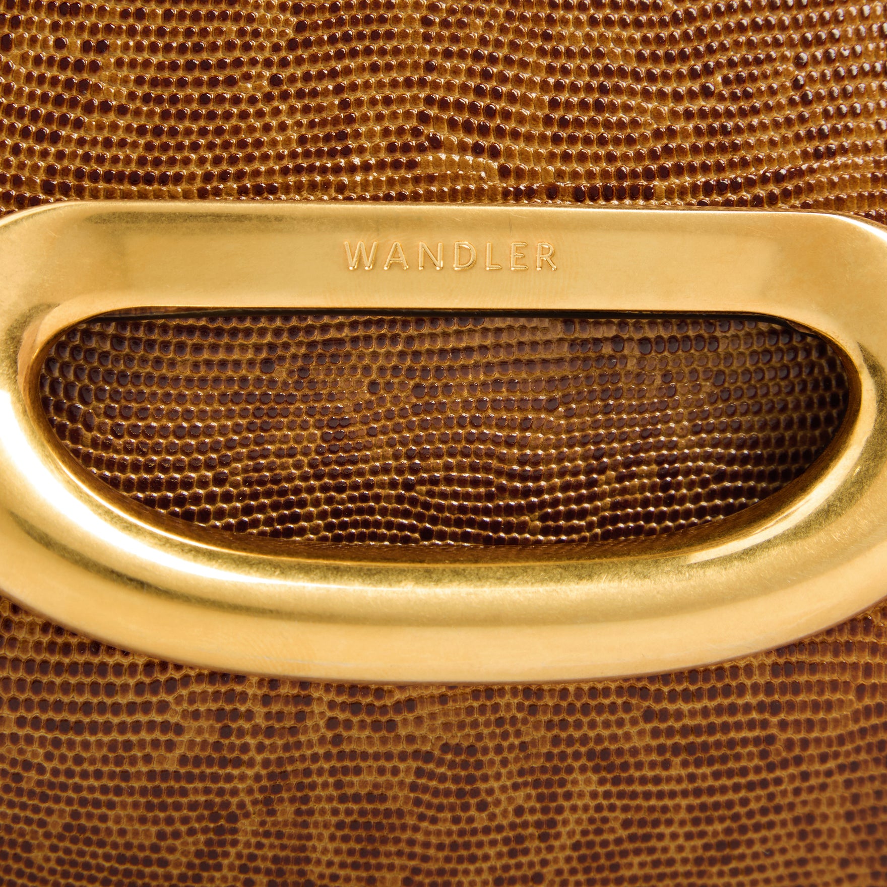 Wandler Veneto Crossbody Small in Tabacco Lizzard, warm brown with lizzard pattern, made from Italian calf leather with golden clasp hardware and structured silhouette, close up detailing the clasp opening. 