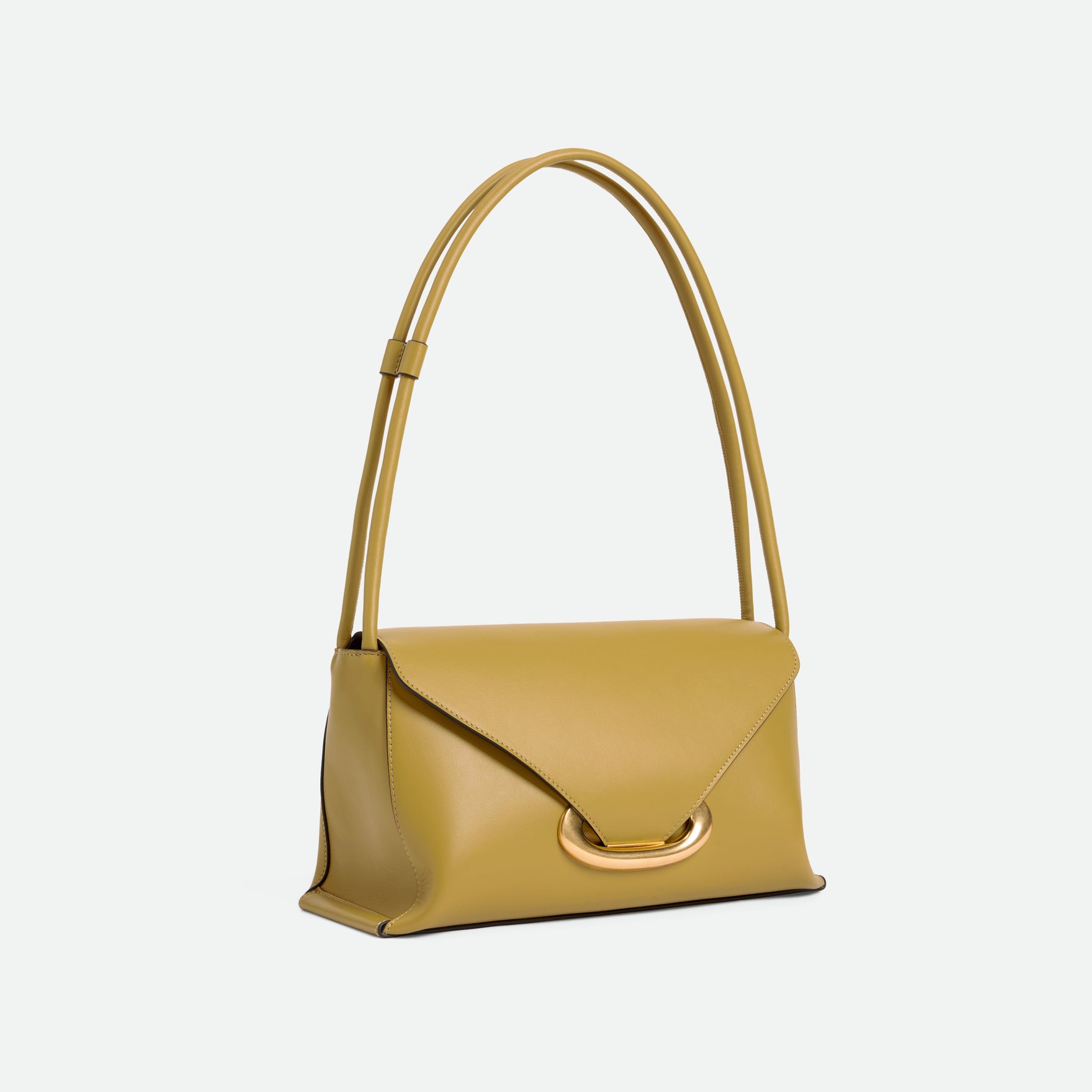 Wandler Veneto Shoulder Bag in the color Saffron, yellow, Italian calf leather with oversized golden clasp hardware and structured silhouette, three quarters view with the straps suspended into the air.