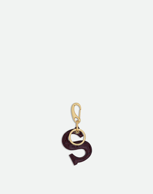 Wandler Bag Charm Letter in the color Bordeaux Croco, Letter S, made from brass, lambskin leather with golden hardware, front view.