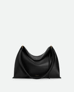 Wandler Penelope Tote Small in the color Black Crust made from calf leather with golden hardware and soft slouchy silhouette, front view.