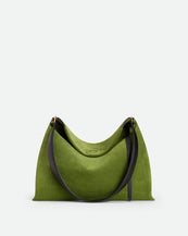 Wandler Penelope Tote Small in the color Verde Suede / Black made from calf leather with golden hardware and soft slouchy silhouette, front view.