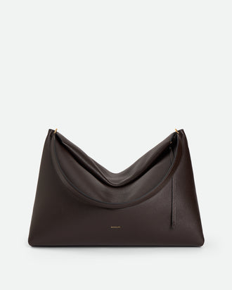 Wandler Penelope Tote in the color Soil Crust, made from Italian calf leather with golden hardware and soft structured silhouette, front view.