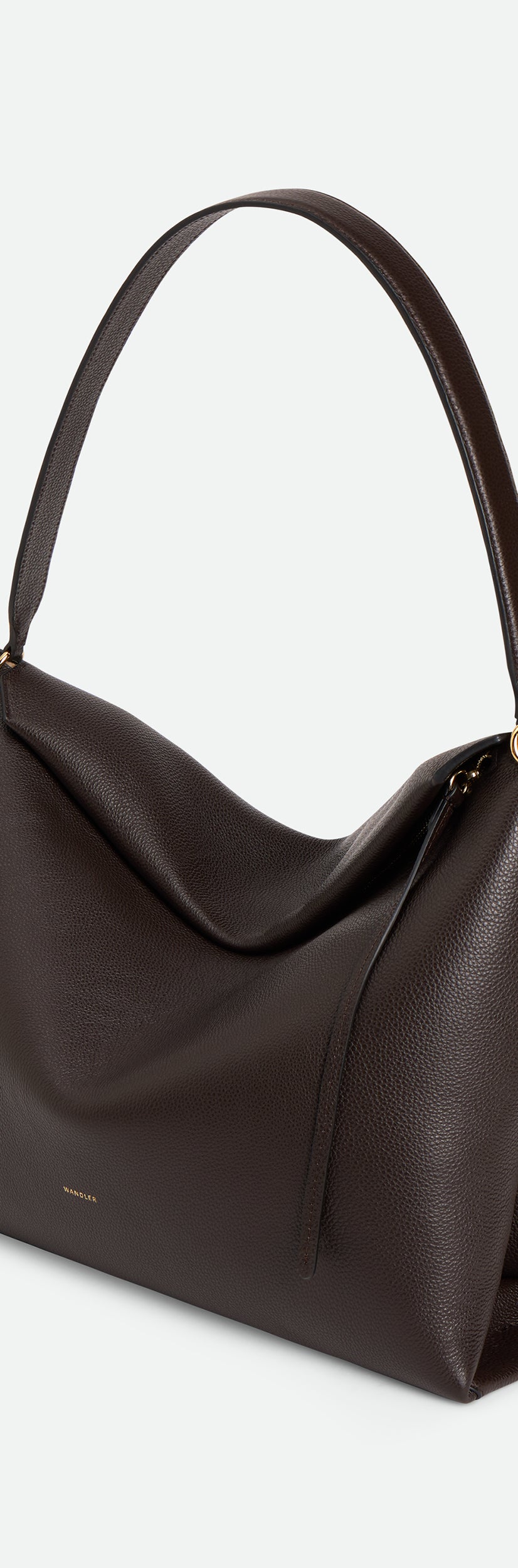 Wandler Penelope Tote in the color Soil Crust, made from Italian calf leather with golden hardware and soft structured silhouette, three quarters view.