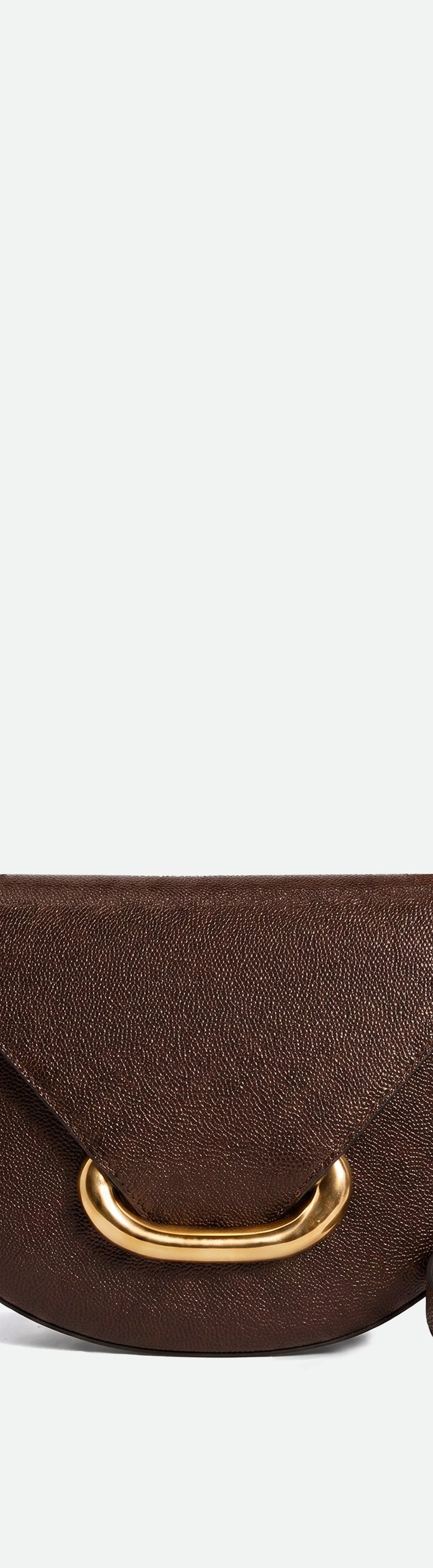 Wandler Veneto Crossbody Bag in Soil Caviar calf leather with oversized golden clasp hardware and structured silhouette, front view. 