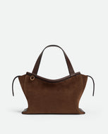 Wandler Ida Bag in Palissander Suede Italian calf leather with golden hardware and sculptural top handle, front view.
