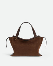 Wandler Ida Bag in Palissander Suede Italian calf leather with golden hardware and sculptural top handle, front view.