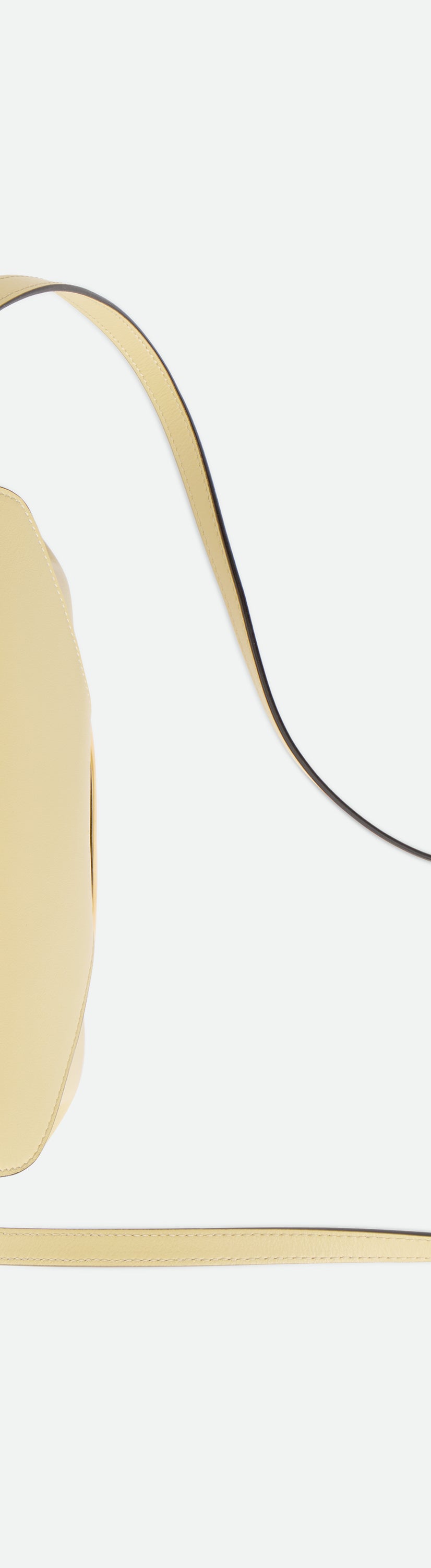 Wandler Veneto Shoulder Bag Small in the color Island, made from Italian calf leather with oversized golden clasp hardware, structured silhouette, topside view, displaying both the top handle as well as the crossbody strap.