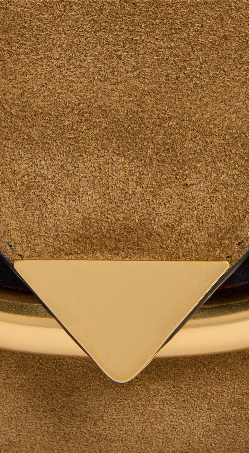 Wandler Veneto Shoulder Bag Small in the color Tabacco Suede, made from Italian calf leather with oversized golden clasp hardware, structured silhouette, close up detailing the clasp and leather.