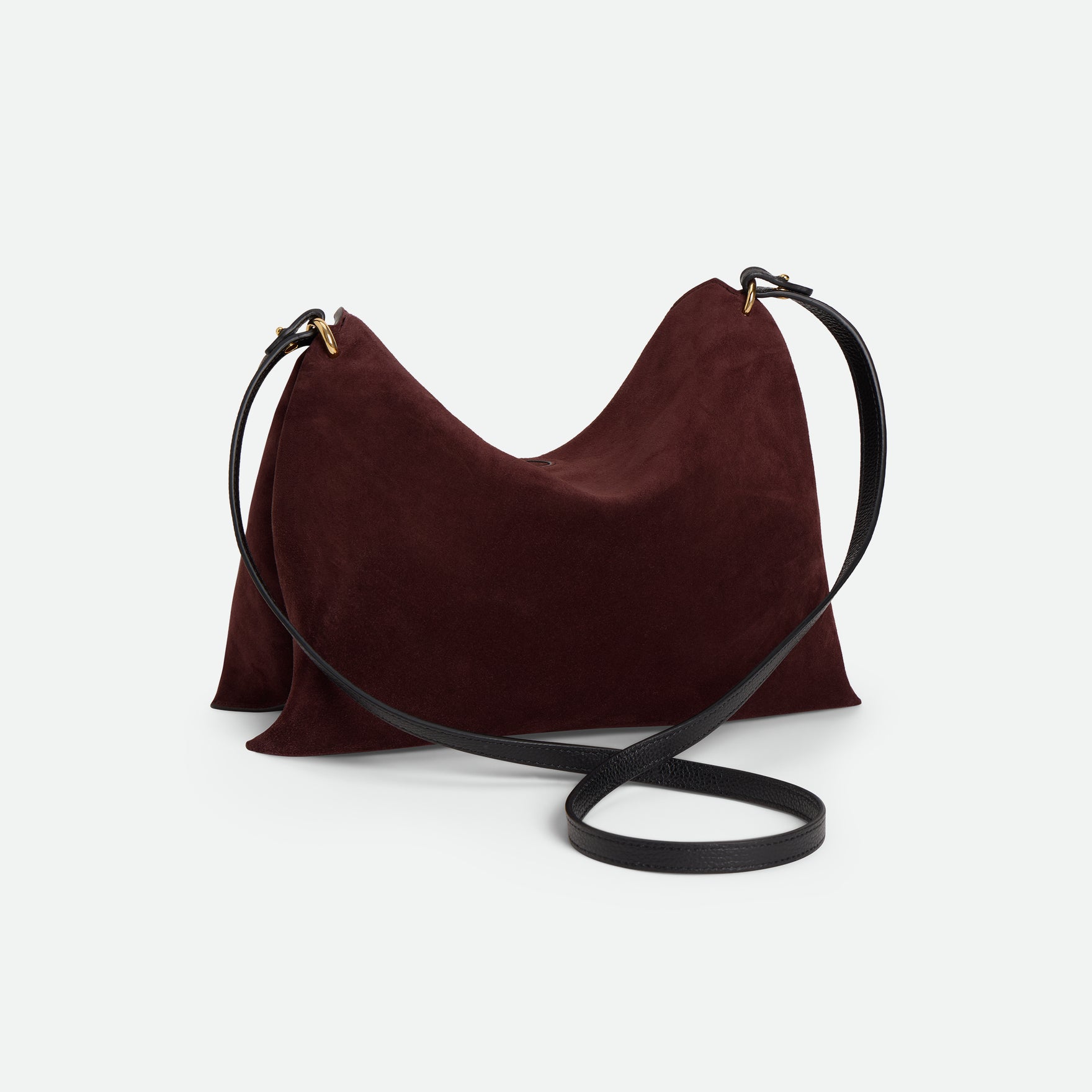 Wandler Penelope Tote Small in the color Acai Suede / Black made from calf leather with golden hardware and soft slouchy silhouette, backside view.