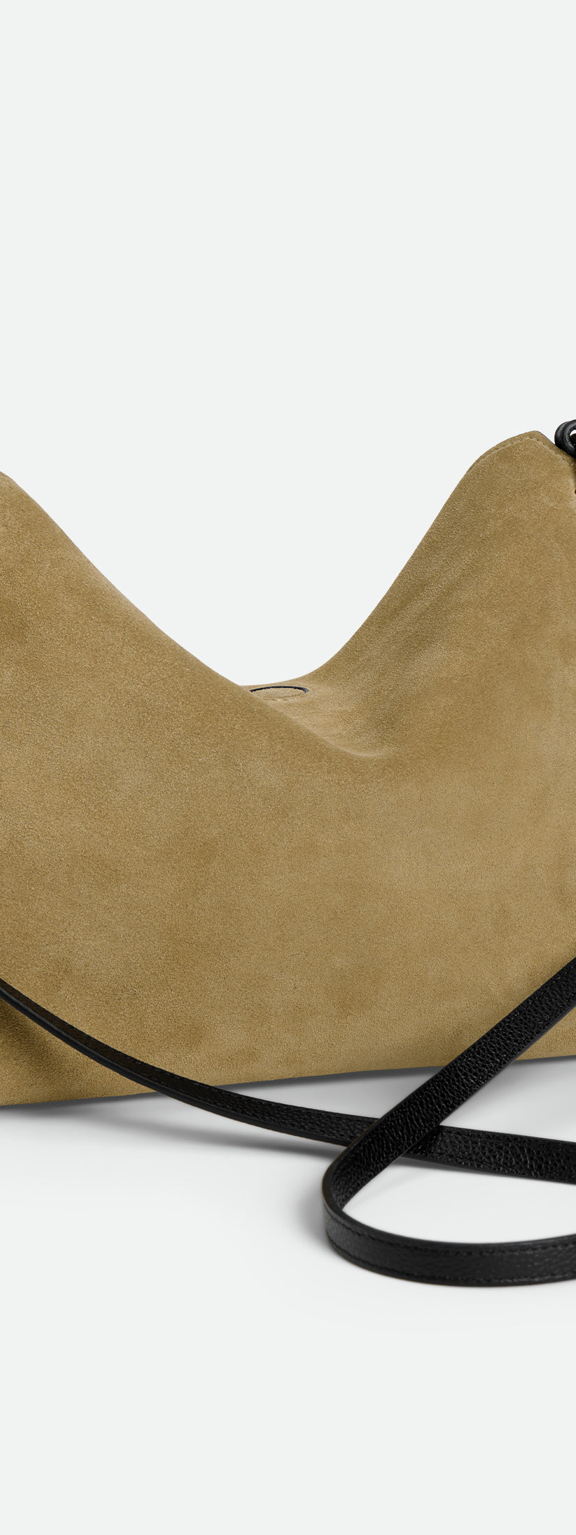 Wandler Penelope Tote Small in the color Khaki Suede / Black made from calf leather with golden hardware and soft slouchy silhouette, backside view.
