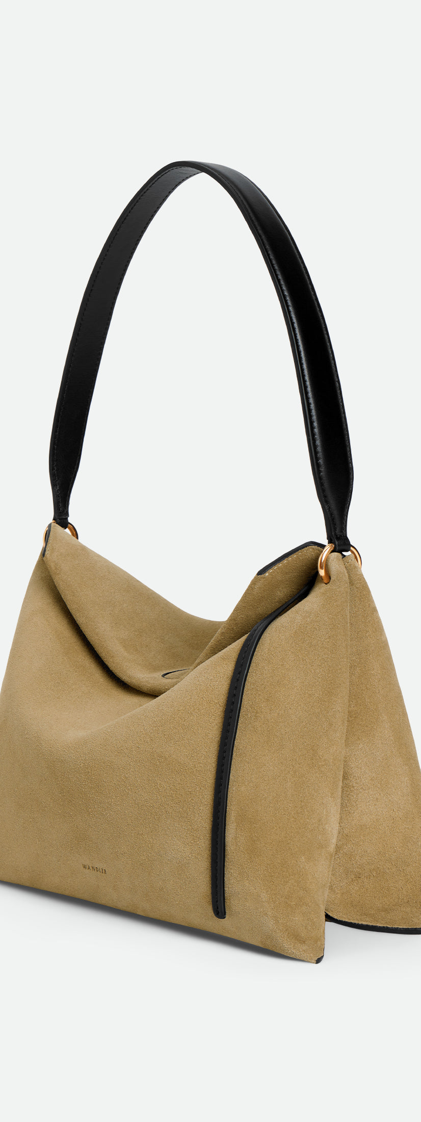 Wandler Penelope Tote Small in the color Acai Suede / Black made from calf leather with golden hardware and soft slouchy silhouette, three quarters view.