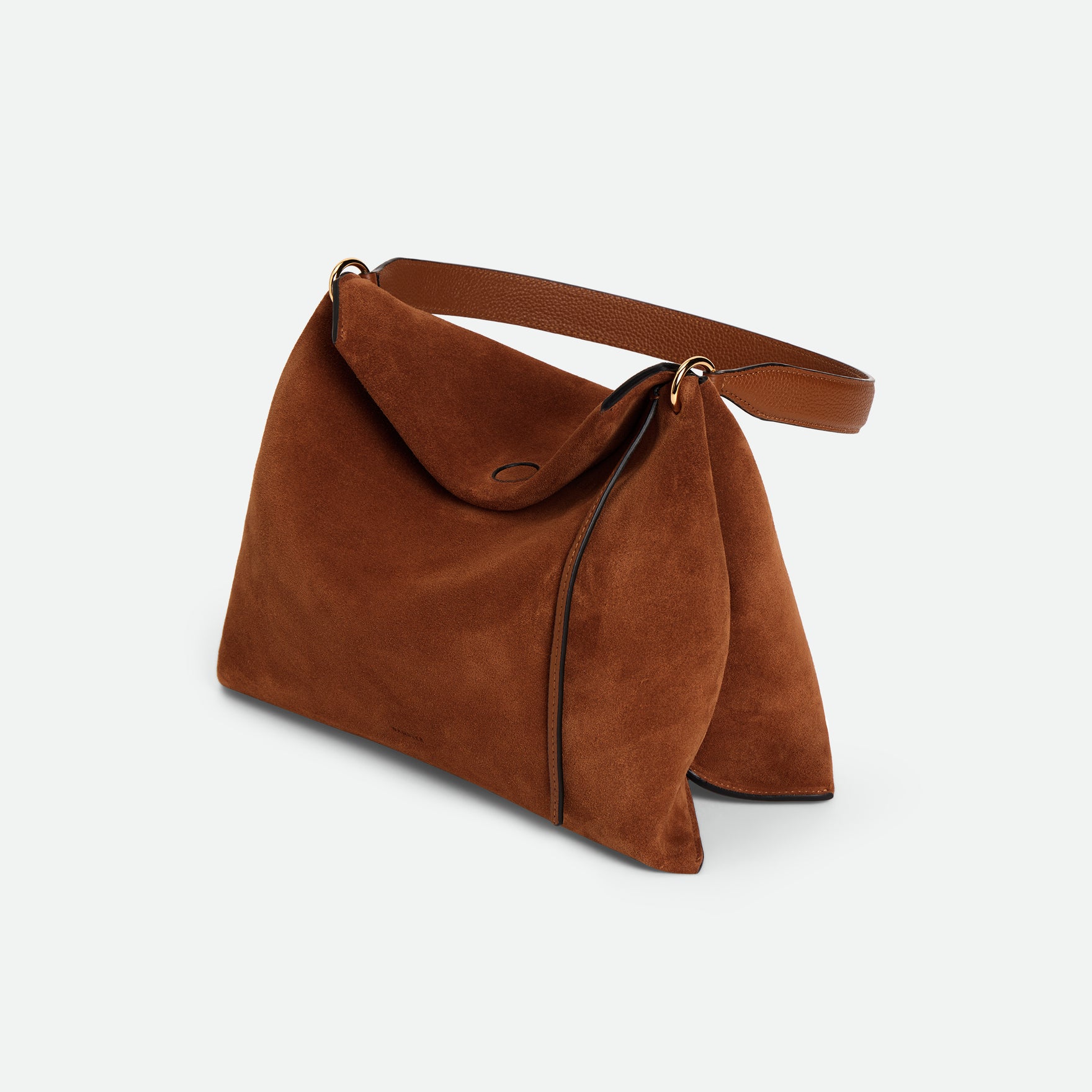 Wandler Penelope Tote Small in the color Saddle Suede calf leather with golden hardware and soft slouchy silhouette, threequarters view.