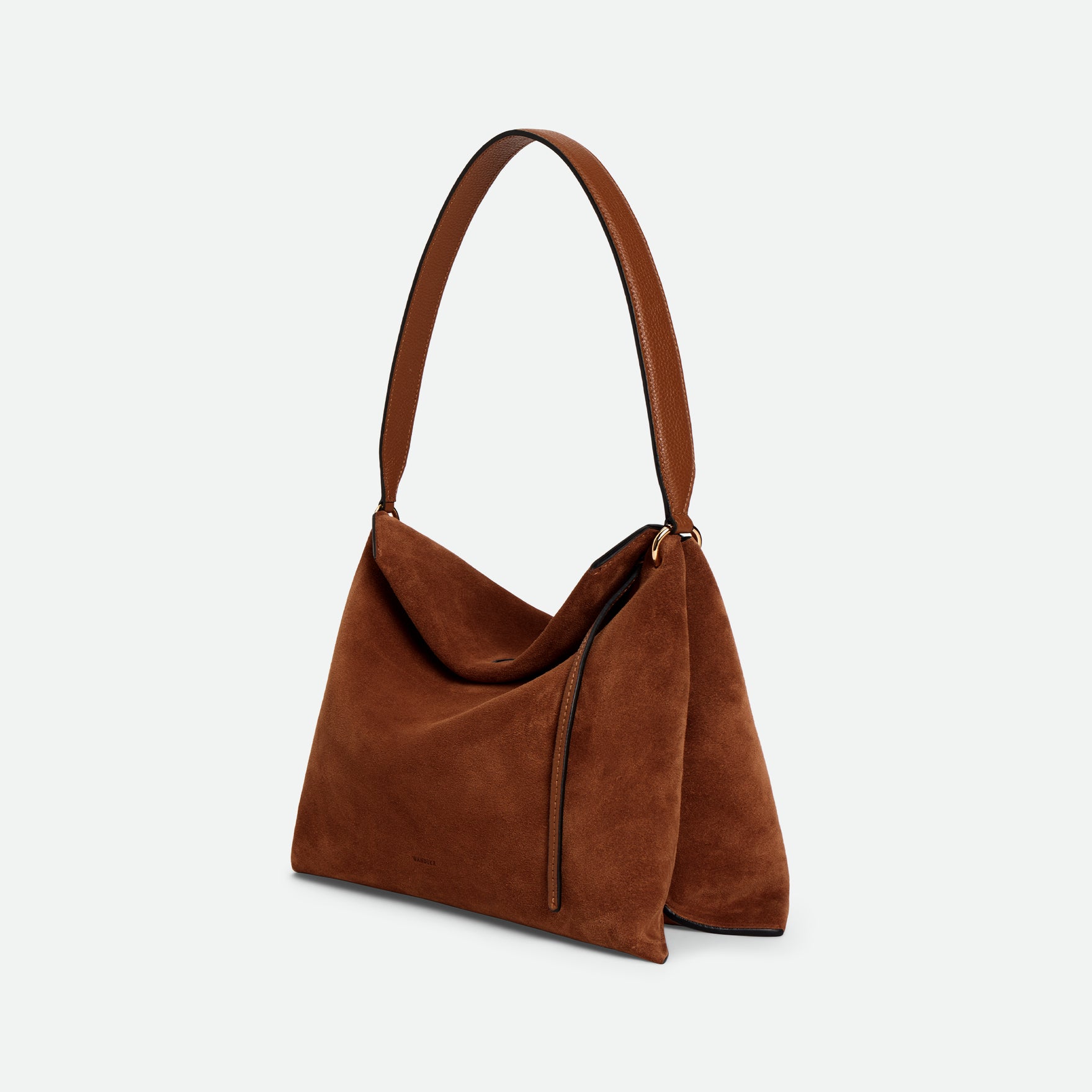 Wandler Penelope Tote Small in the color Saddle Suede calf leather with golden hardware and soft slouchy silhouette, three quarters view.