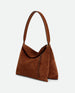 Wandler Penelope Tote Small in the color Saddle Suede calf leather with golden hardware and soft slouchy silhouette, three quarters view.