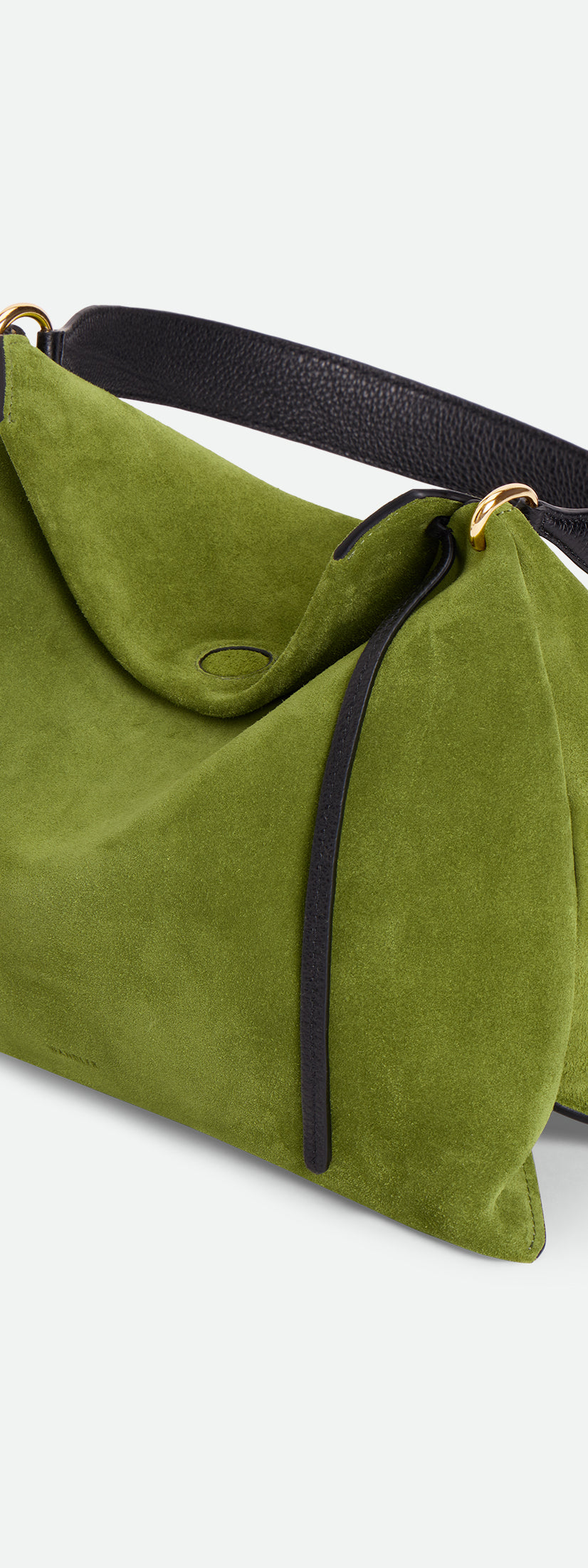 Wandler Penelope Tote Small in the color Verde Suede / Black made from calf leather with golden hardware and soft slouchy silhouette, pictured from above, three quarters view.