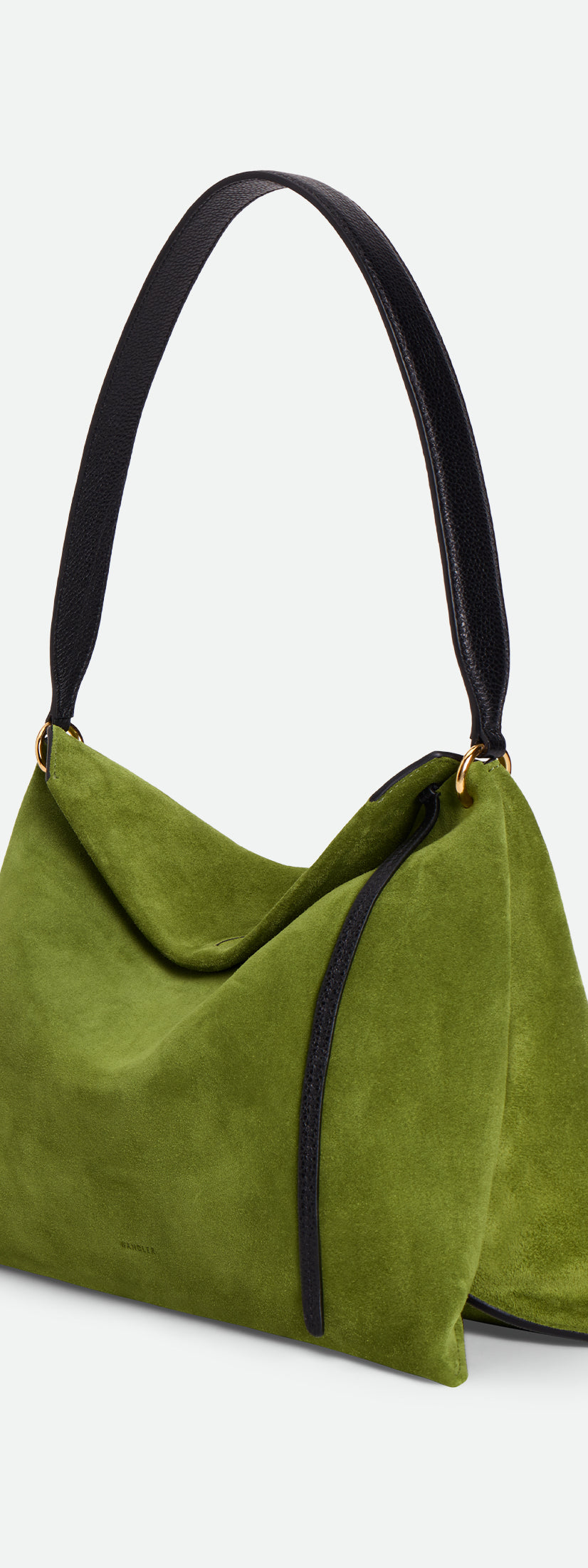Wandler Penelope Tote Small in the color Verde Suede / Black made from calf leather with golden hardware and soft slouchy silhouette, three quarters view.
