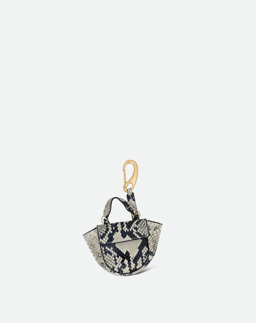 Wandler Hortensia Micro in the color Black  / White Python, black and white with snake print, leather with golden hardware, shown as a bag charm, front view.