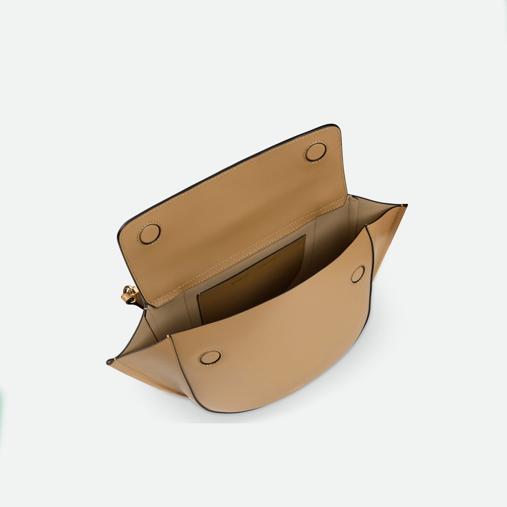 Wandler Hortensia Bag Mini in the color Gingerbread, dark beige, Italian calf leather with golden hardware, rounded silhouette and top handle. The bag is pictured from the front with the flap open, giving a slight view of the inside of the bag.