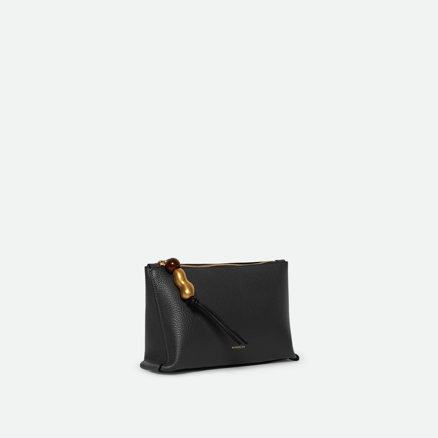 Wandler Ida Case in Space Crust, grey,  calf leather with golden zipper hardware and charm, three quarters view.
