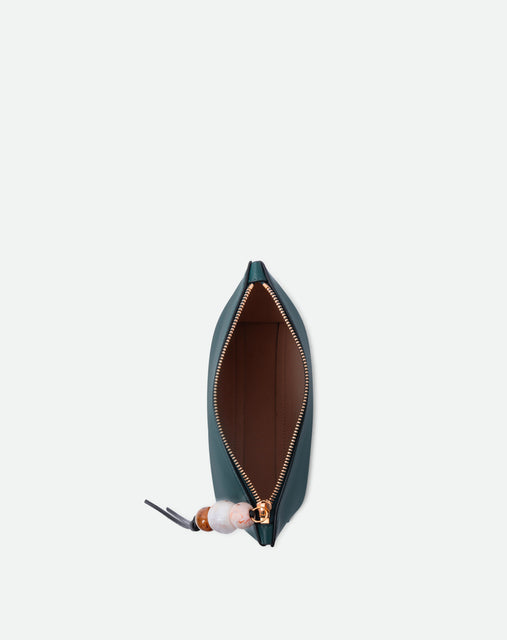 Wandler Ida Case in Teal made from calf leather with golden zipper hardware and charm, topside view with open zipper allowing for a glimpse of the inside of the case.
