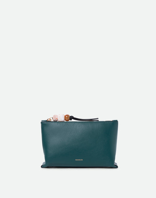 Wandler Ida Case in Teal made from calf leather with golden zipper hardware and charm, front view.
