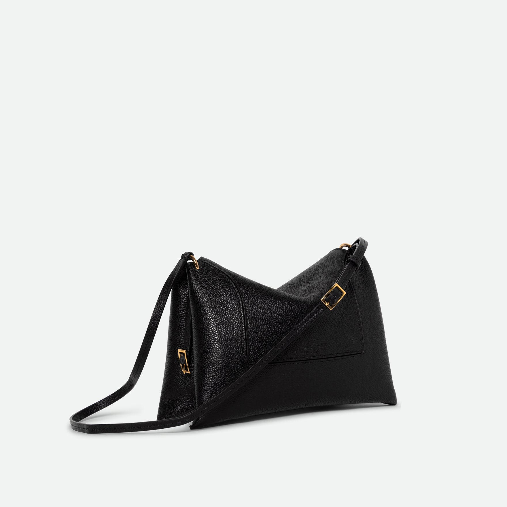 Wandler Penelope Slouch Bag in the color Black Crust, made from smooth calf leather with golden hardware and adjustable slim strap, three quarters angle.