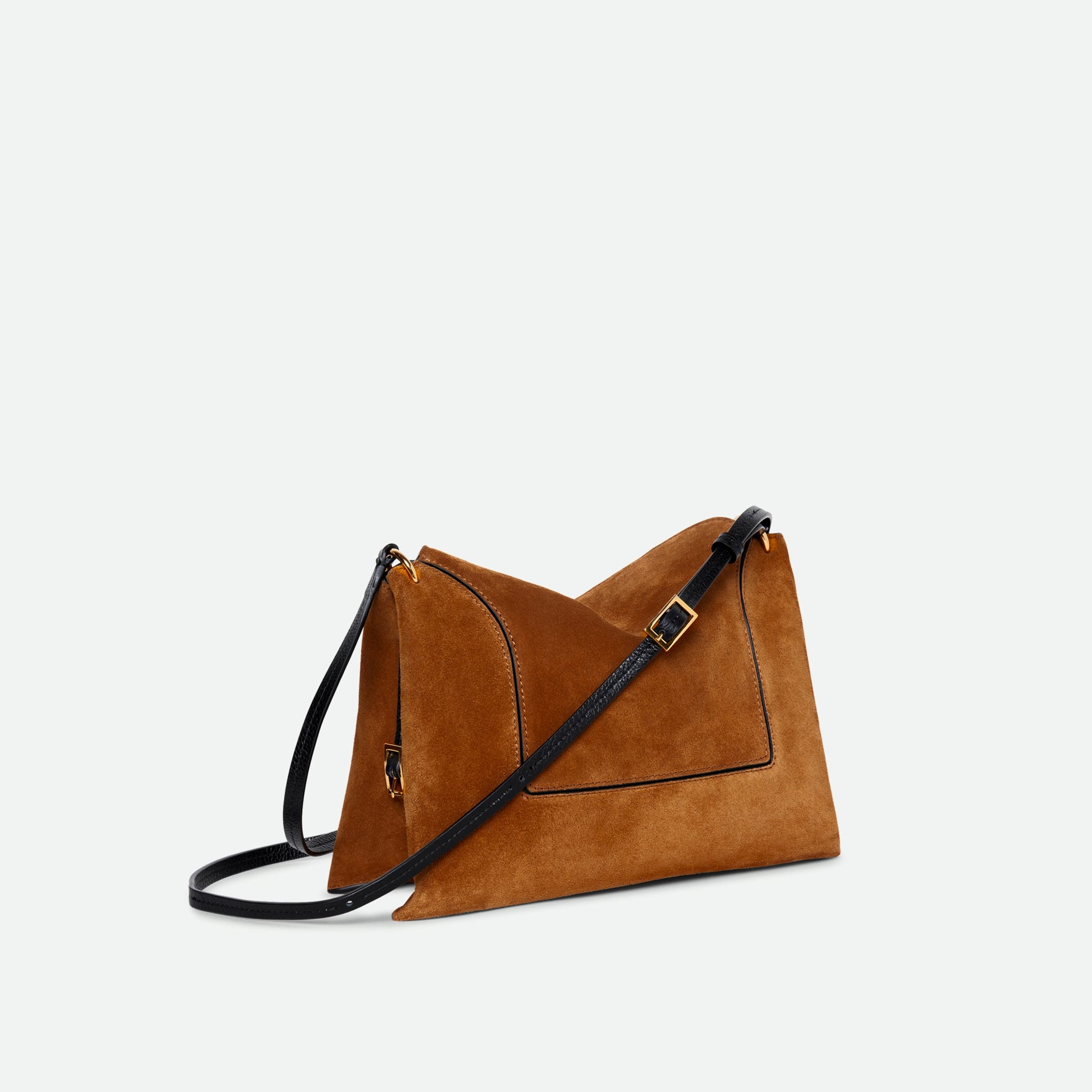Wandler Penelope Slouch Bag in the color Cognac Suede, made from calf leather with golden hardware and adjustable slim strap, three quarters view.