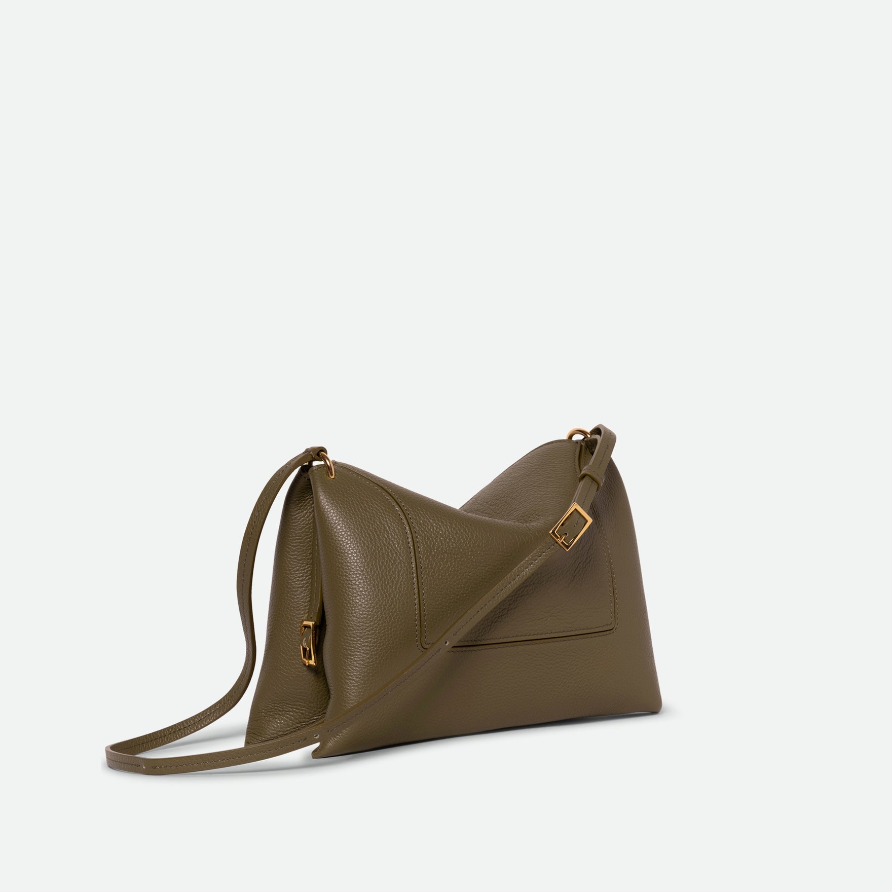 Wandler Penelope Slouch Bag in the color Olive Crust, green, made from smooth calf leather with golden hardware and adjustable slim strap, three quarters view.