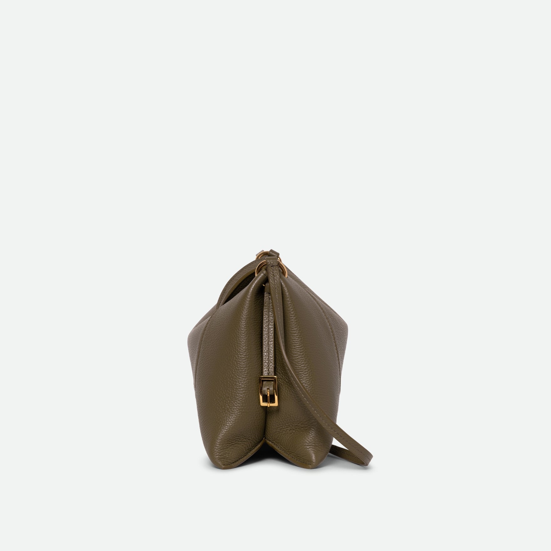 Wandler Penelope Slouch Bag in the color Olive Crust, green, made from smooth calf leather with golden hardware and adjustable slim strap, side view.