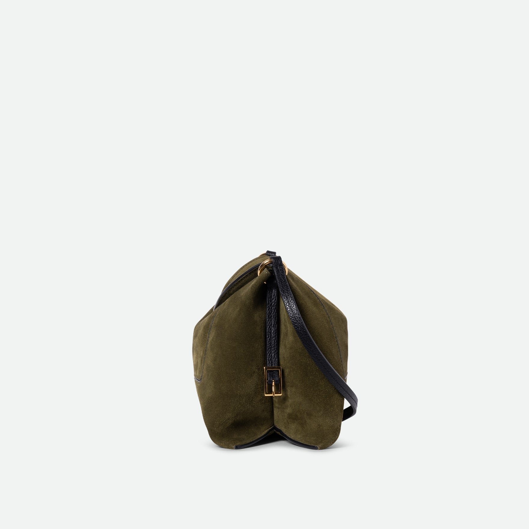 Wandler Penelope Slouch Bag in the color Orion Crust deep dark blue, made from calf leather with golden hardware and adjustable slim strap, side view. 
