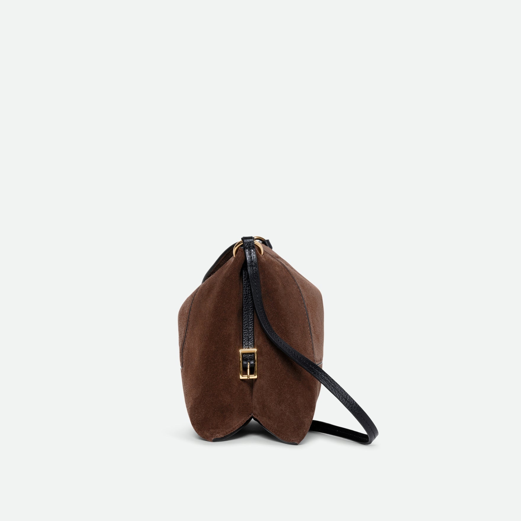 Wandler Penelope Slouch Bag in the color Palissander Suede, made from calf leather with golden hardware and adjustable slim strap, side view.