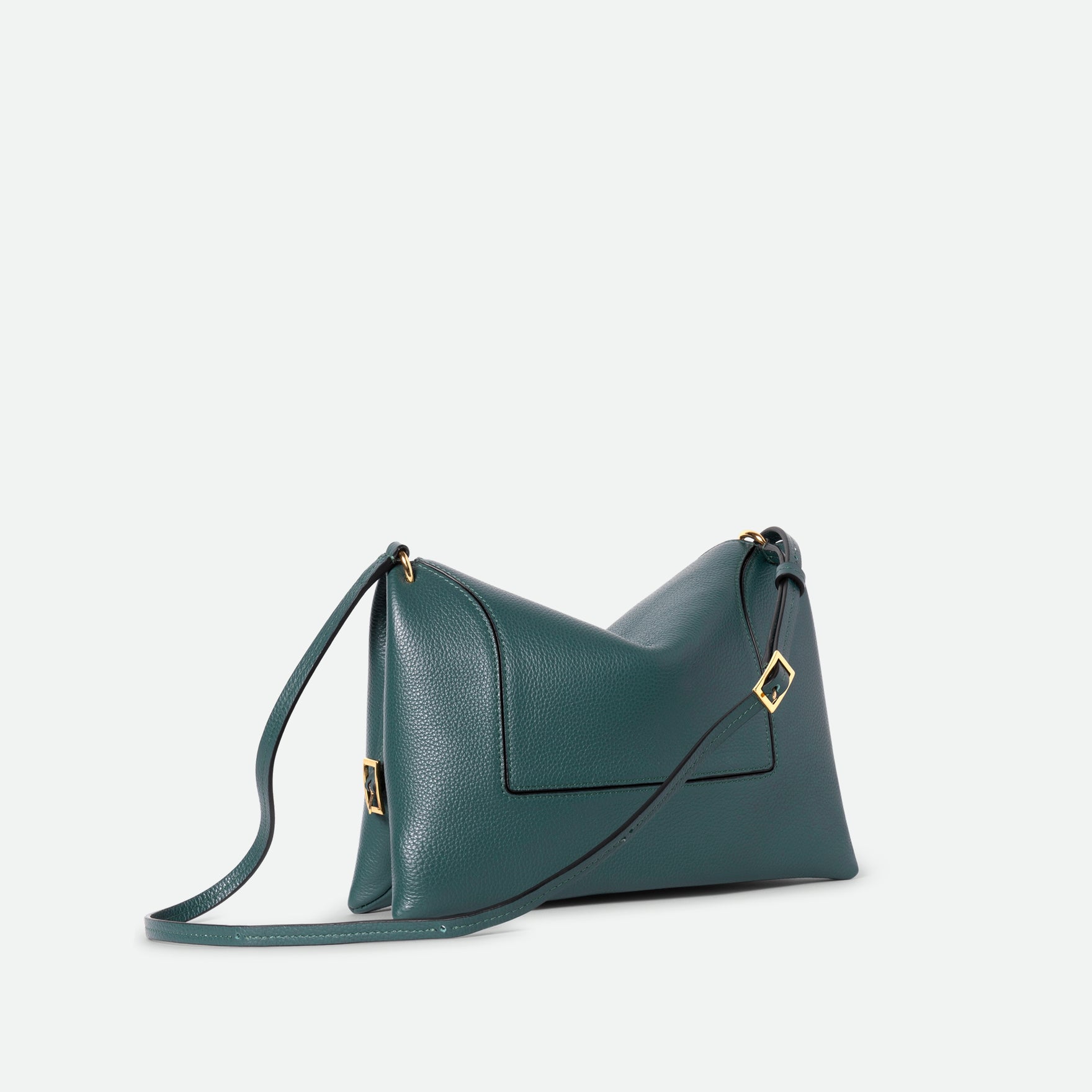 Wandler Penelope Slouch Bag in the color Teal Crust made from calf leather with golden hardware and adjustable slim strap, three quarters view.