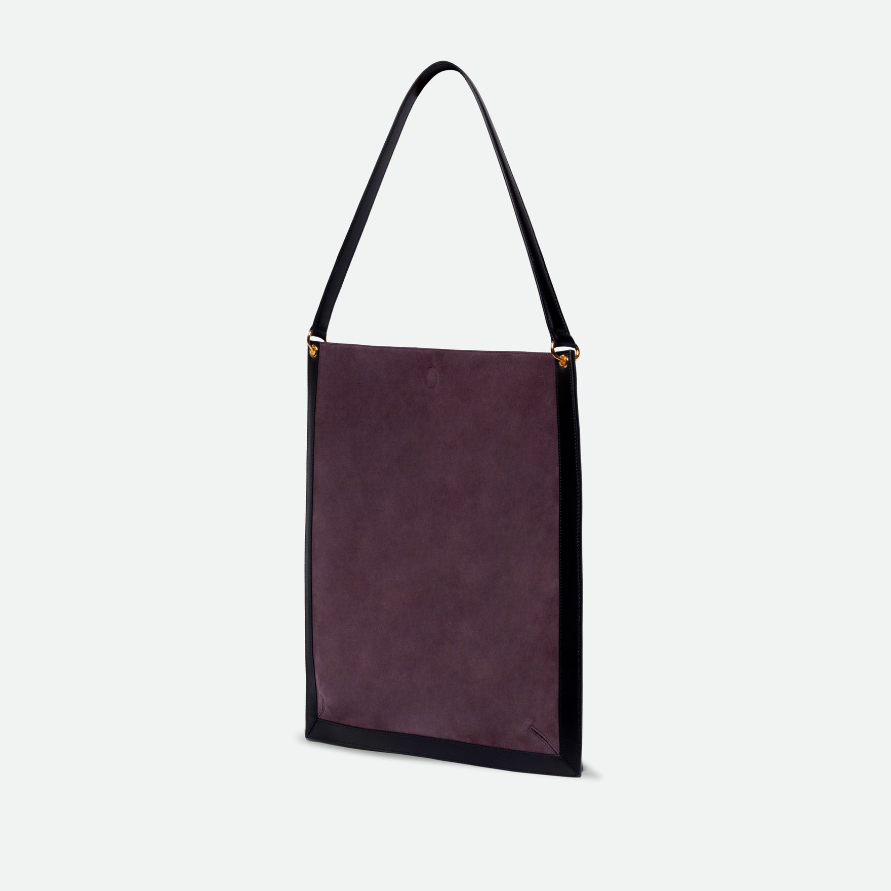 Wandler Penny Tote in the color Grape, made from Italian calf leather with hand-painted black edges and golden hardware, three quarters view.