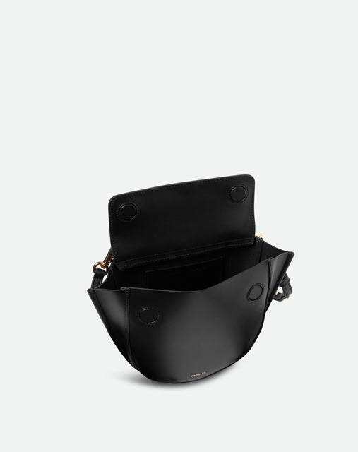 Wandler Hortensia Bag Mini in the color black, Italian calf leather with golden hardware, rounded silhouette and top handle. The bag is pictured from the front with the flap open, giving a slight view of the inside of the bag.