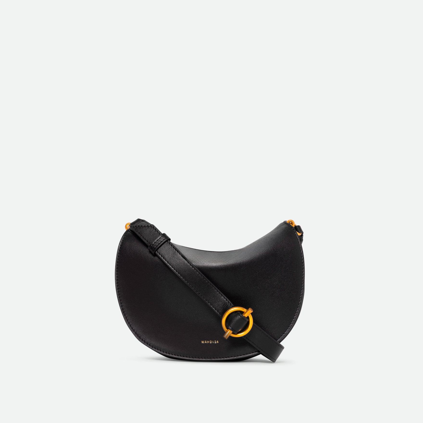Wandler Kate Bag in the color Black, made from Italian calf leather with golden hardware and adjustable shoulder strap, front view.