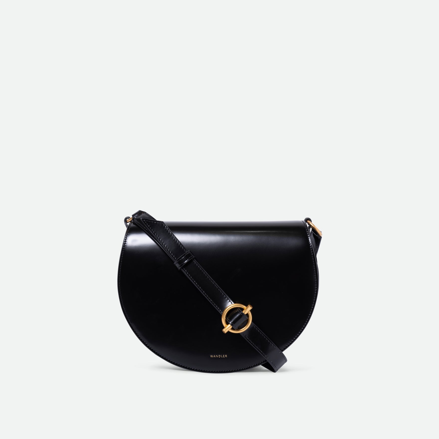 Wandler Kate Saddle Bag in the color Jazz Olive, deep dark green, calf leather with golden hardware and adjustable shoulder strap, front view,