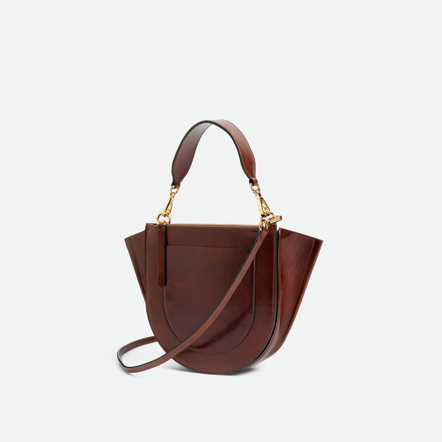 Wandler Hortensia Bag Small in the color Palissander Glaze, deep dark brown with red undertones, Italian calf leather with golden hardware and rounded silhouette, backside view.
