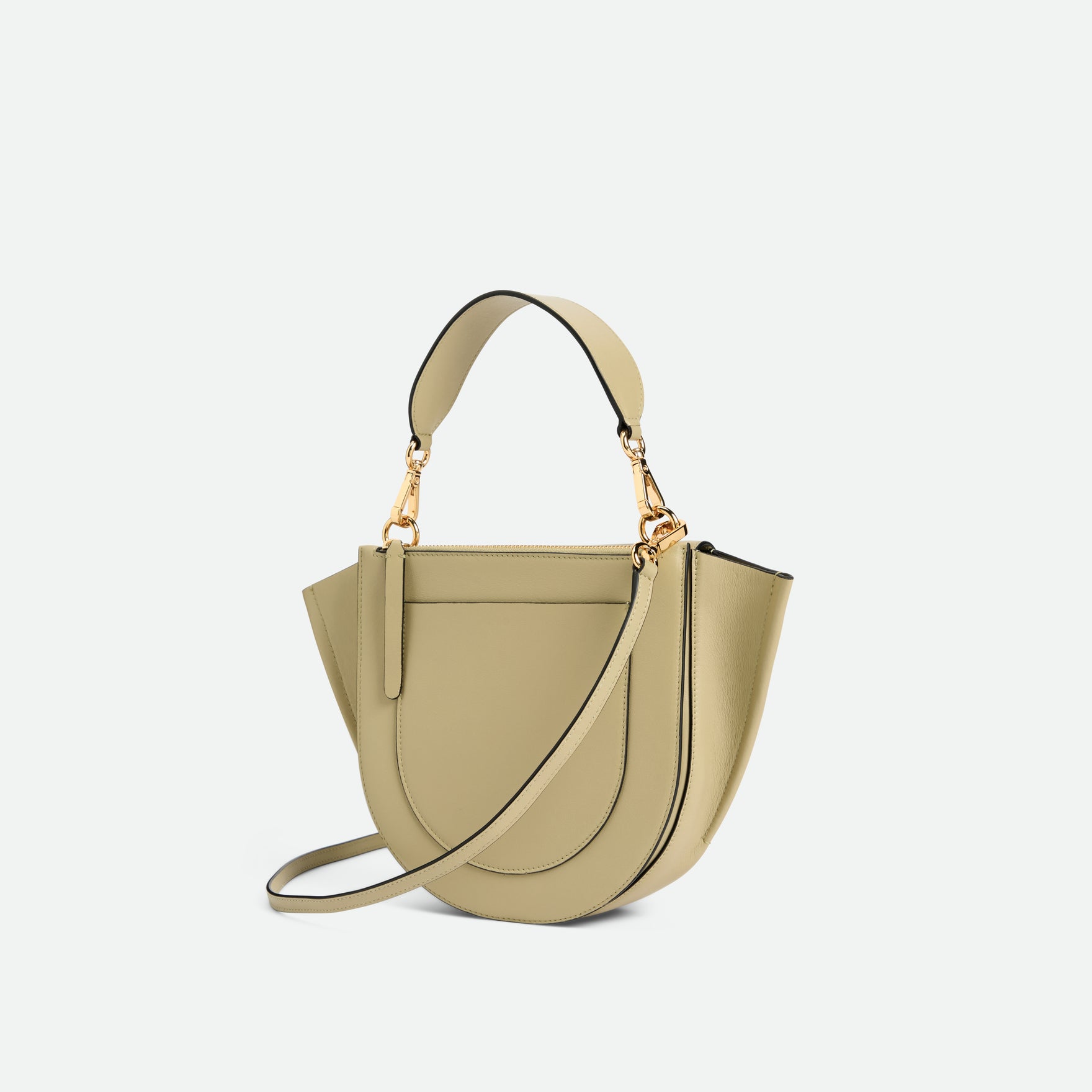 Wandler Hortensia Bag Small in the color Peper, dark beige, Italian calf leather with golden hardware and rounded silhouette, backside view.
