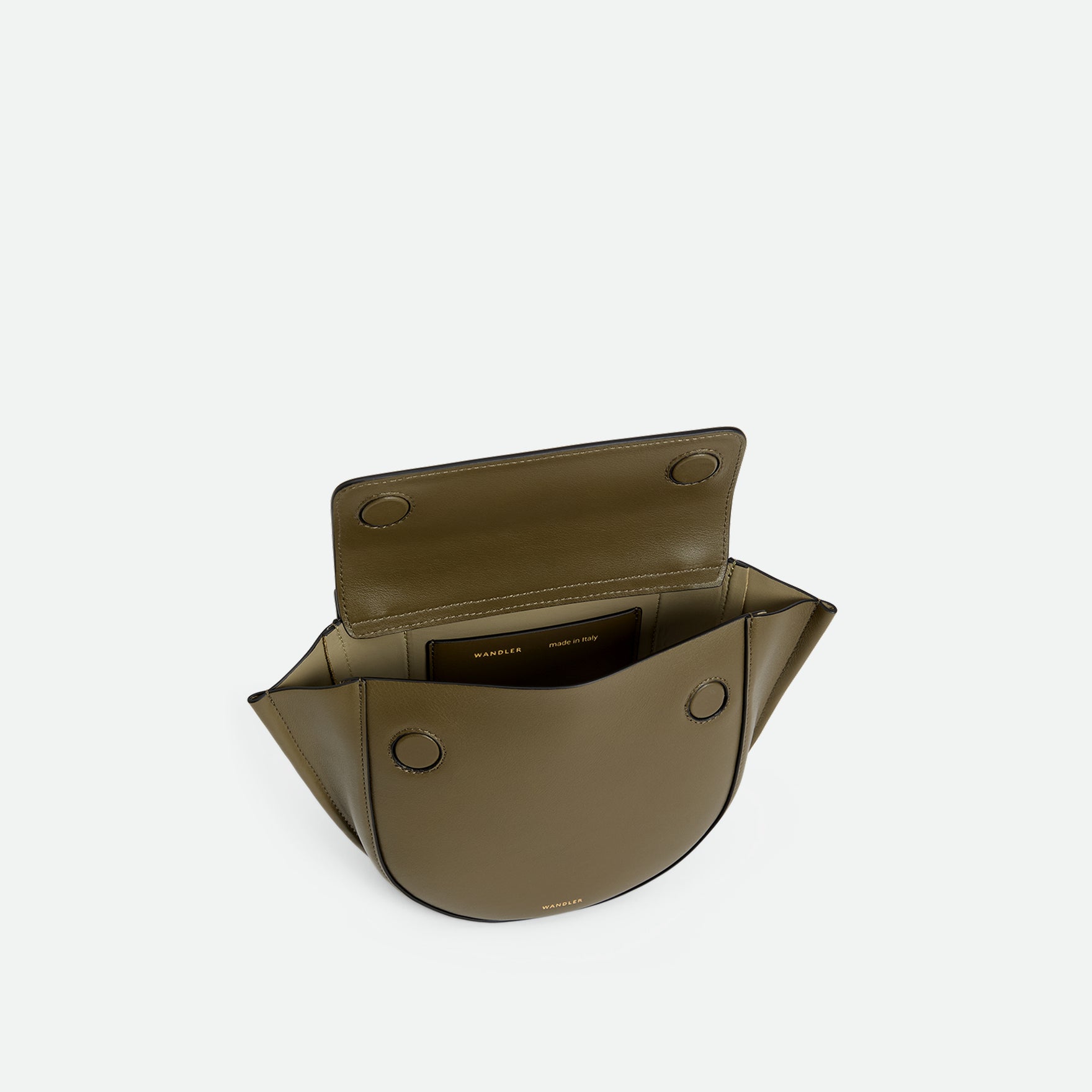 Wandler Hortensia Bag Mini in the color Deep Olive, Olive green, made from Italian calf leather with golden hardware, rounded silhouette and top handle, pictured from above, giving a glimpse into the inside of the bag. 
