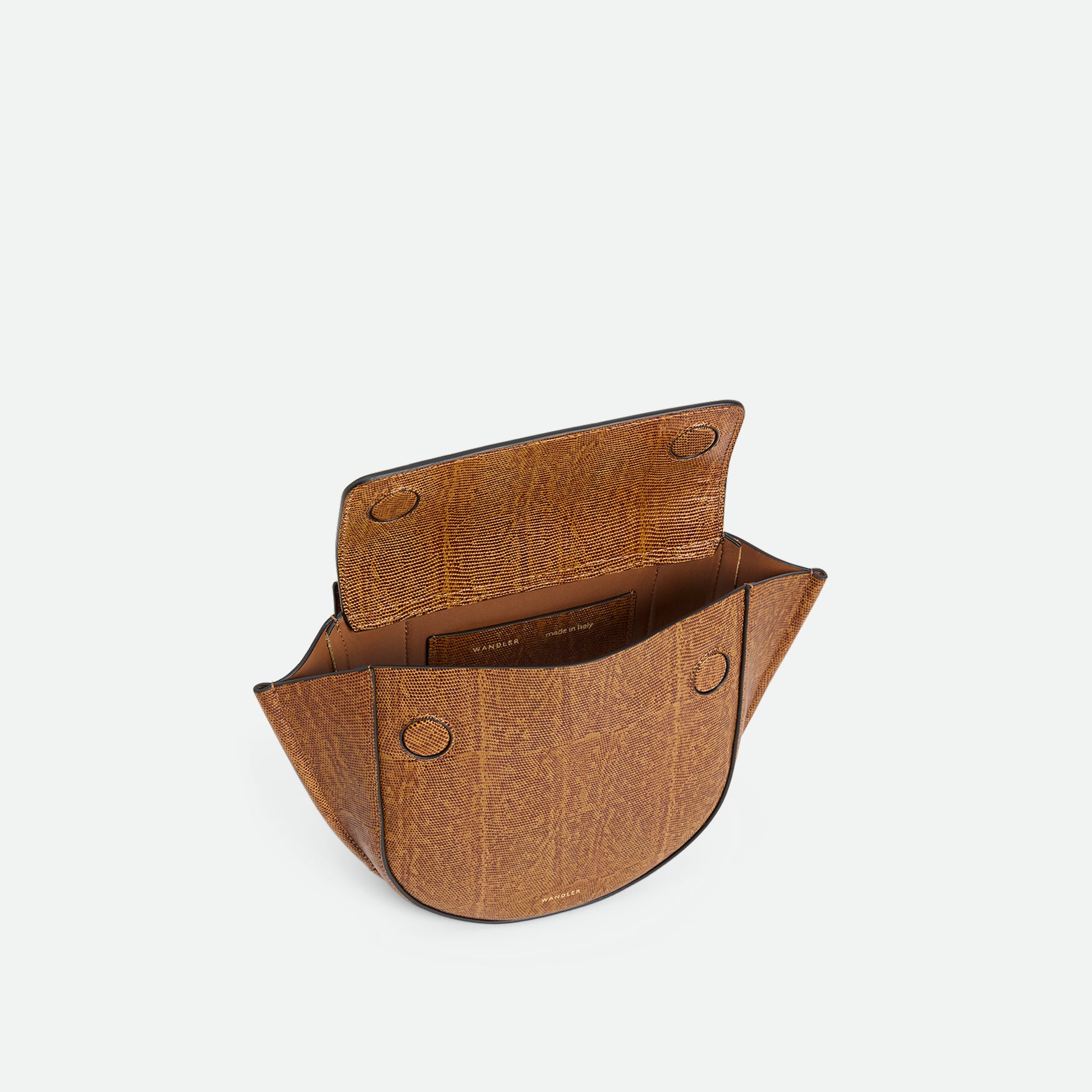 Wandler Hortensia Bag Mini in the color Tabacco Lizzard, warm brown with lizzard motive, made from Italian calf leather with golden hardware, rounded silhouette and top handle, pictured from above, giving a glimpse into the inside of the bag. 