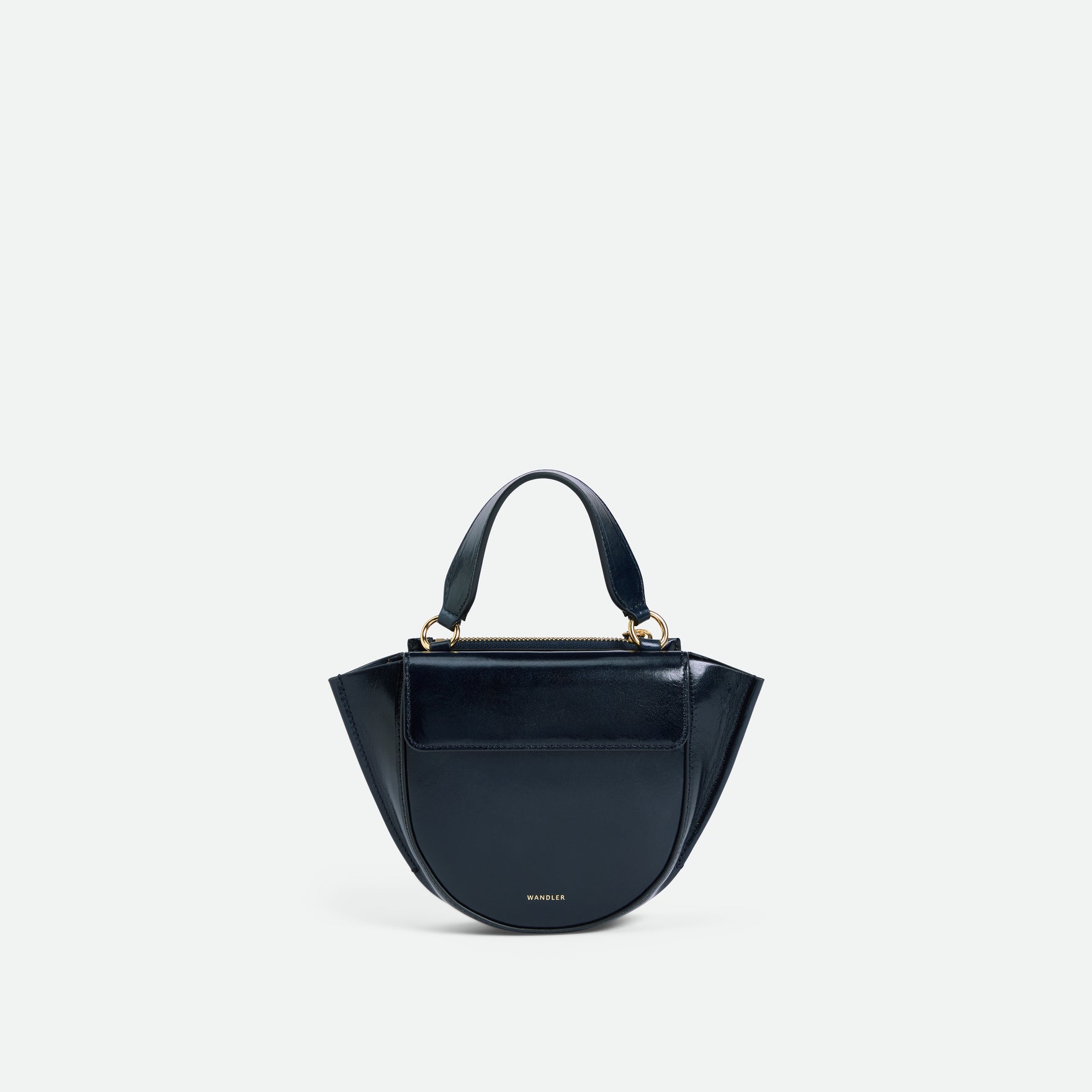 Wandler Hortensia Bag Piccola in the color Orion Glaze, shiny dark blue, made from Italian calf leather with golden hardware and rounded silhouette, front view.