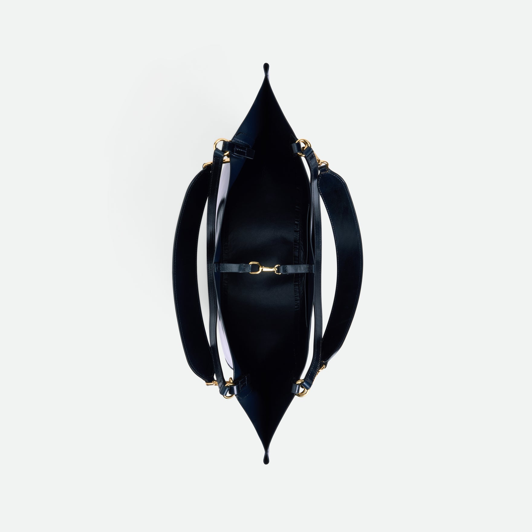 Wandler Hortensia Tote in Orion Glaze Italian calf leather with golden hardware, hand-painted edges and rounded silhouette, pictured from above displaying the inside of the bag and hook closure.