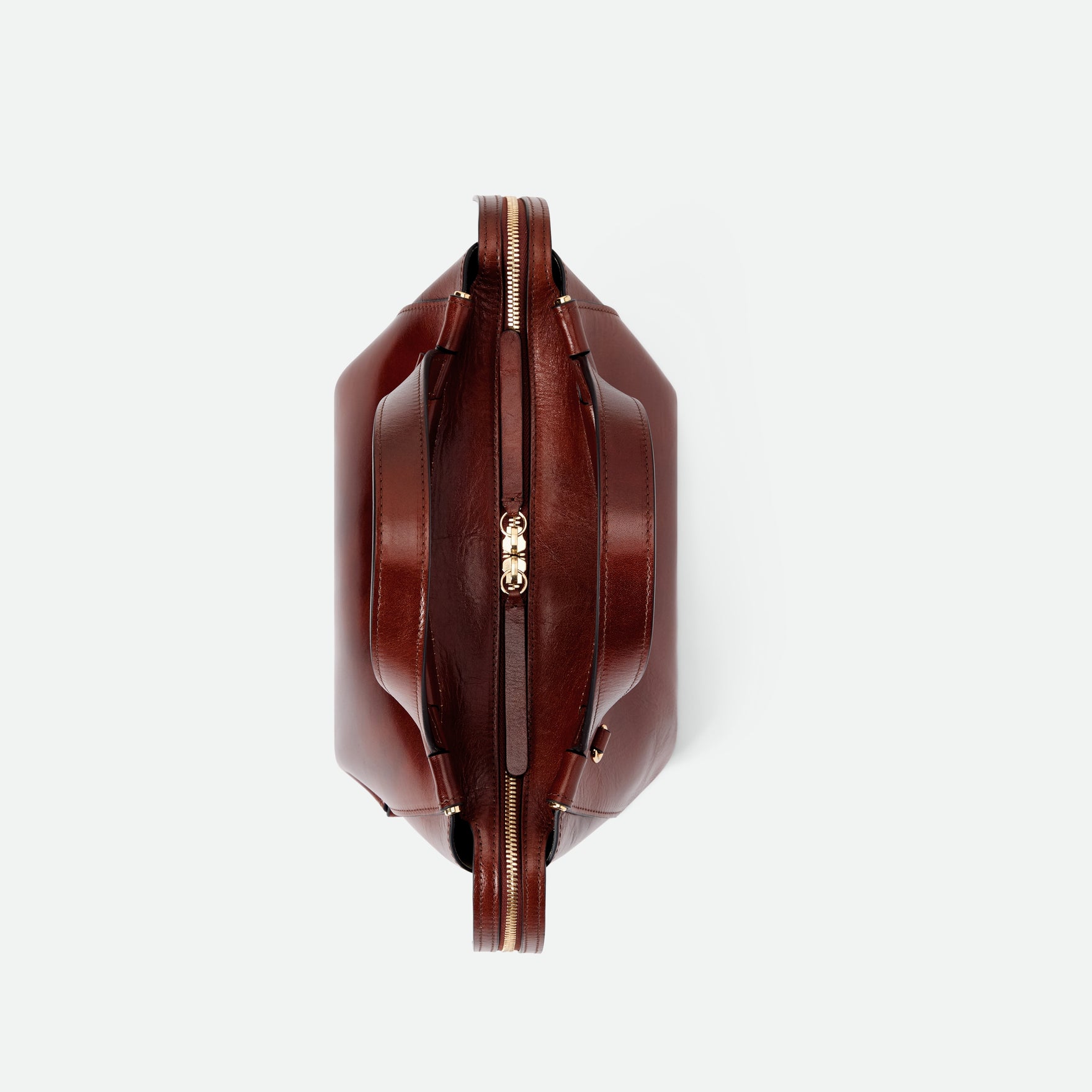 Wandler Ida Bag in the color Palissander Glaze, deep dark brown with red undertones, made from Italian calf leather with golden hardware and sculptural top handle, topside view. 