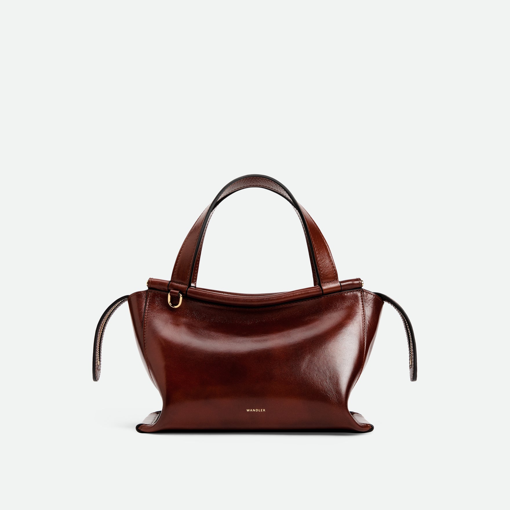 Wandler Ida Bag in the color Palissander Glaze, deep dark brown with red undertones, made from Italian calf leather with golden hardware and sculptural top handle, front view. 