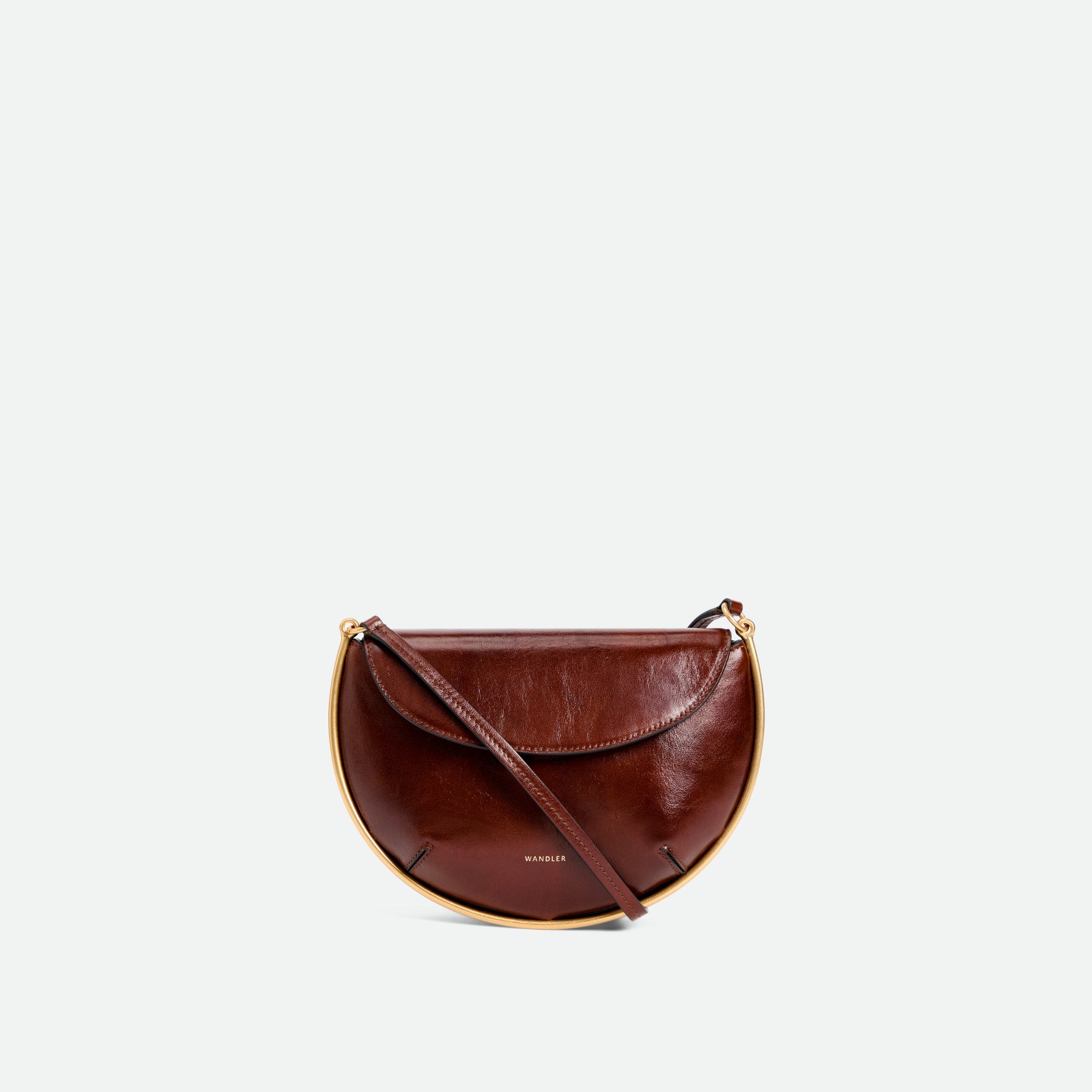 Wandler Kate Mini Crossbody in the color Palissander Glaze, Deep dark brown with red undertones, made from Italian calf leather with golden hardware and adjustable strap, front view. 