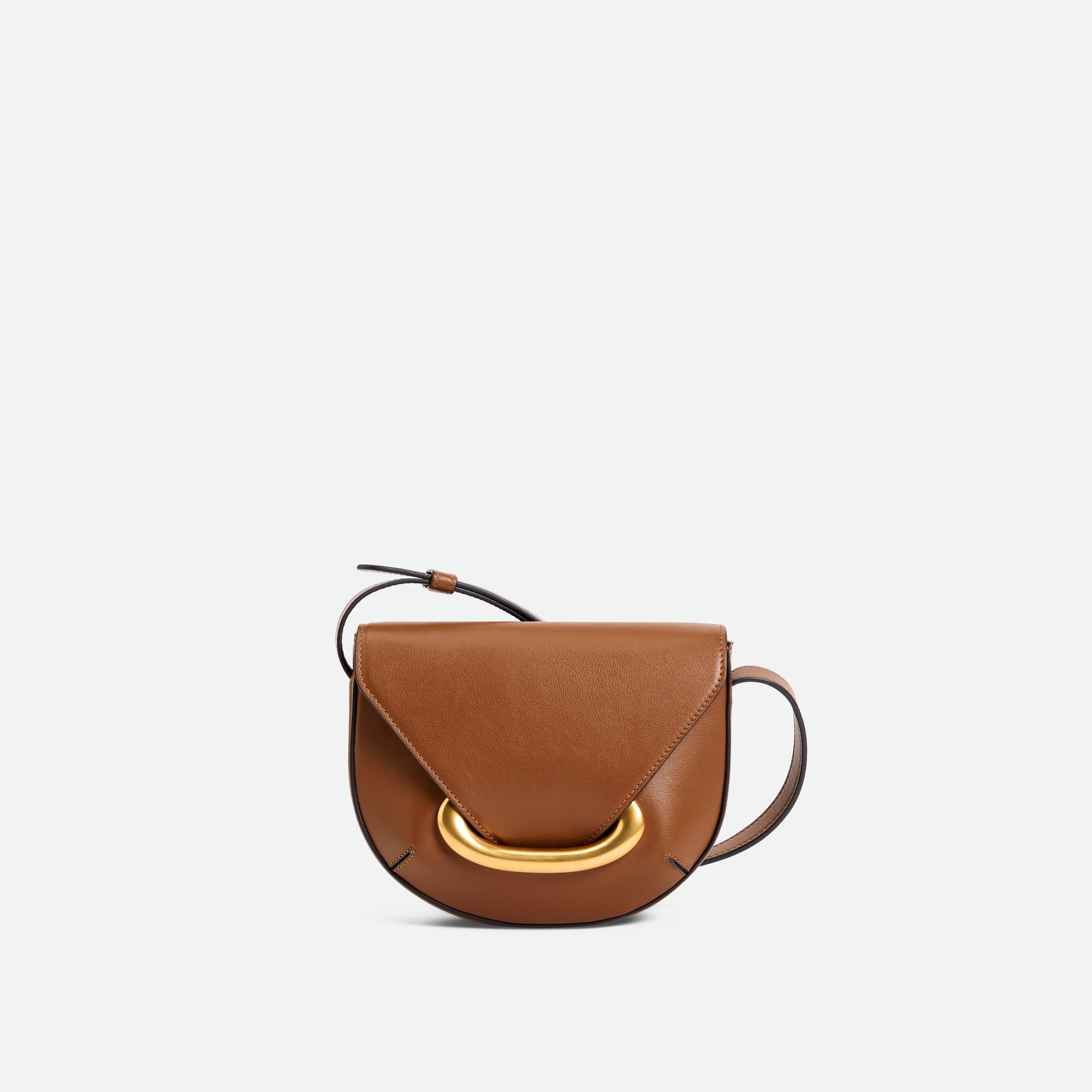 Wandler Veneto Crossbody Small in Saddle, warm brown, made from Italian calf leather with golden clasp hardware and structured silhouette, front view.