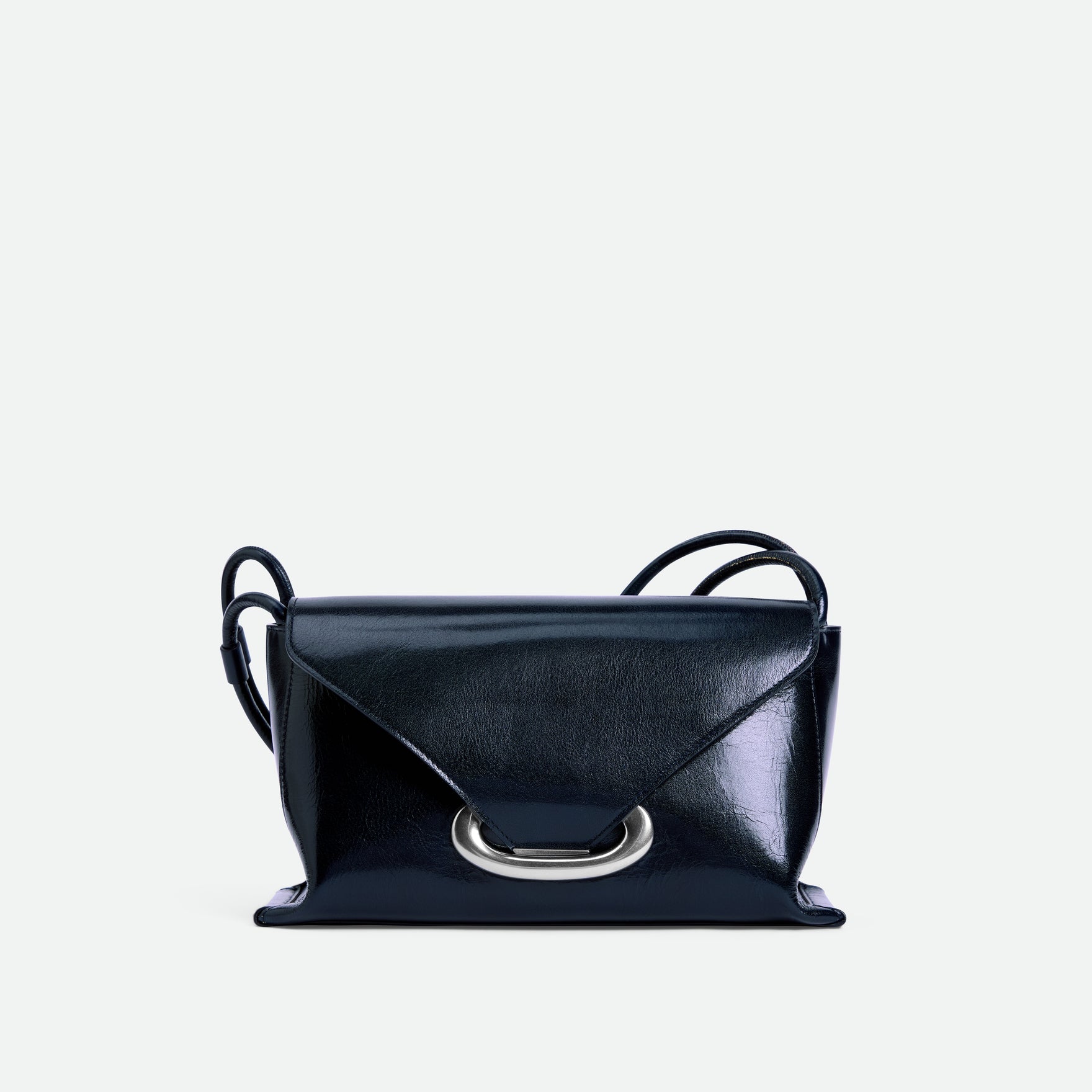 Wandler Veneto Shoulder Bag in the color Orion Glaze, deep dark blue, Italian calf leather with oversized silver clasp hardware and structured silhouette, front view.