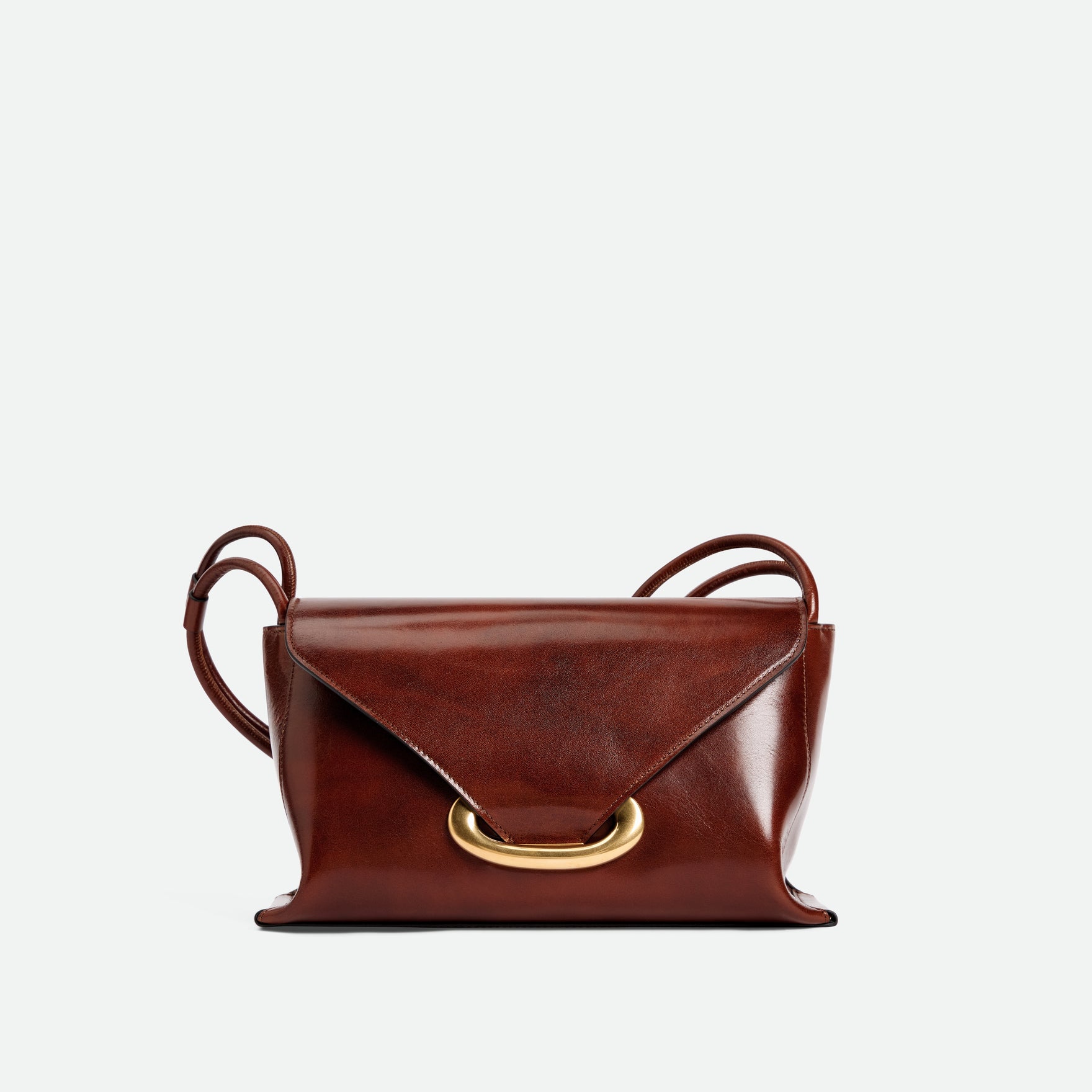 Wandler Veneto Shoulder Bag in the color Palissander Glaze, deep dark blue, Italian calf leather with oversized golden clasp hardware and structured silhouette, front view.